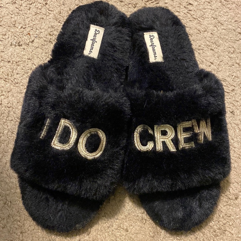 Black fuzzy “I Do Crew” slippers
